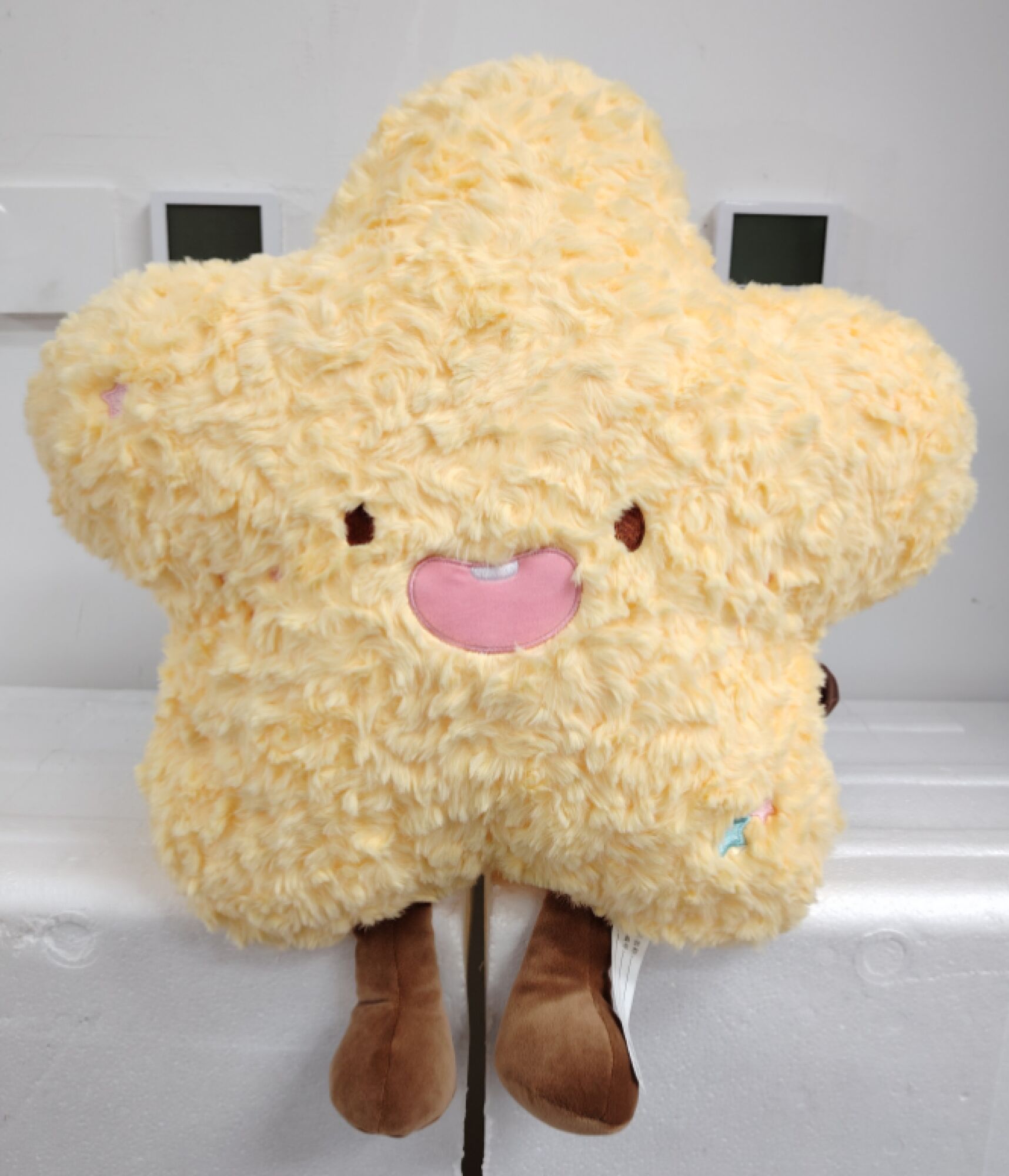 90012 Almohada estrella con sonrisa 40CM